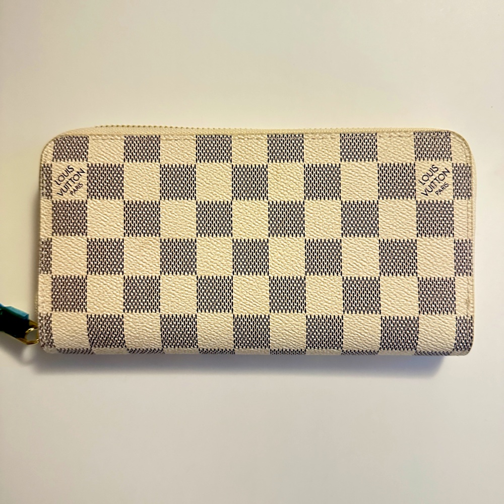 Louis Vuitton checkered wallet from France. New condition and never used.